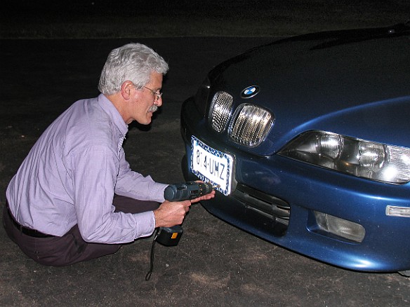 Jim has the envious job of attaching the new plates May 30, 2006 8:37 PM : Jim Hoffman